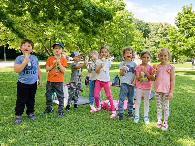Summer Camp at Handprints: children playing outside in the garden